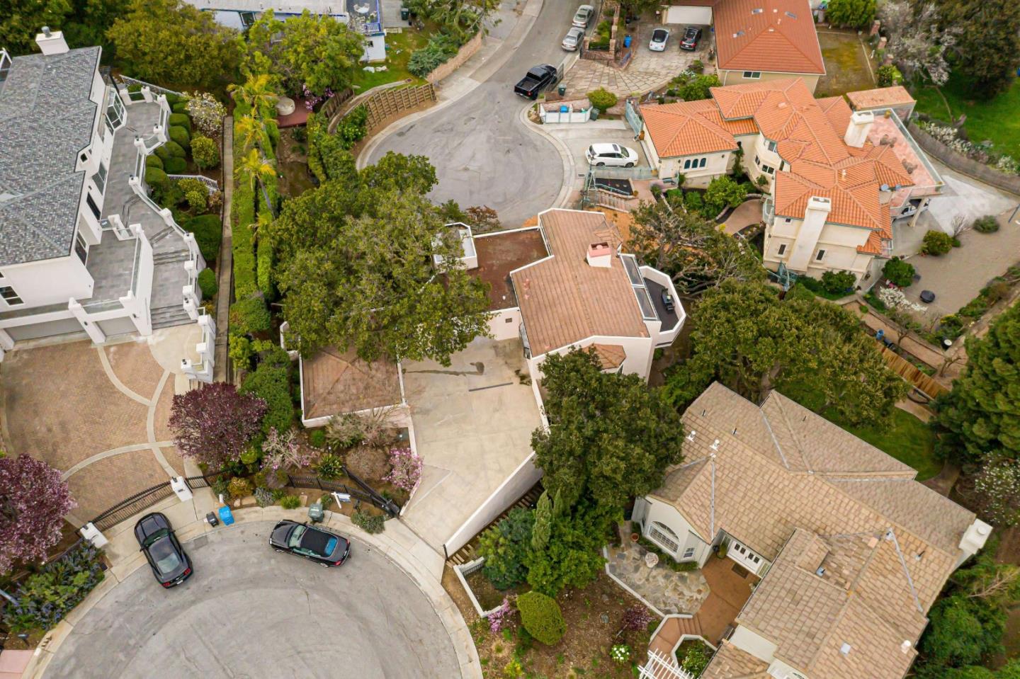 745 Holly Road Belmont, CA 94002 - Photo 44 of 50 an aerial view of a house with yard and parking