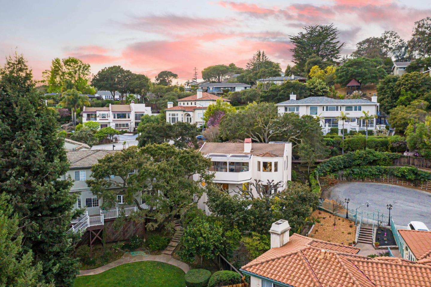 745 Holly Road Belmont, CA 94002 - Photo 47 of 50 an aerial view of multiple houses with a yard
