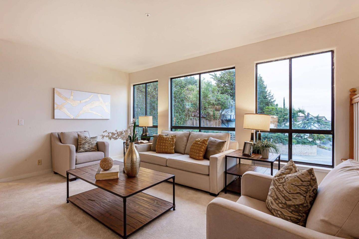 745 Holly Road Belmont, CA 94002 - Photo 8 of 50 a living room with furniture and a large window