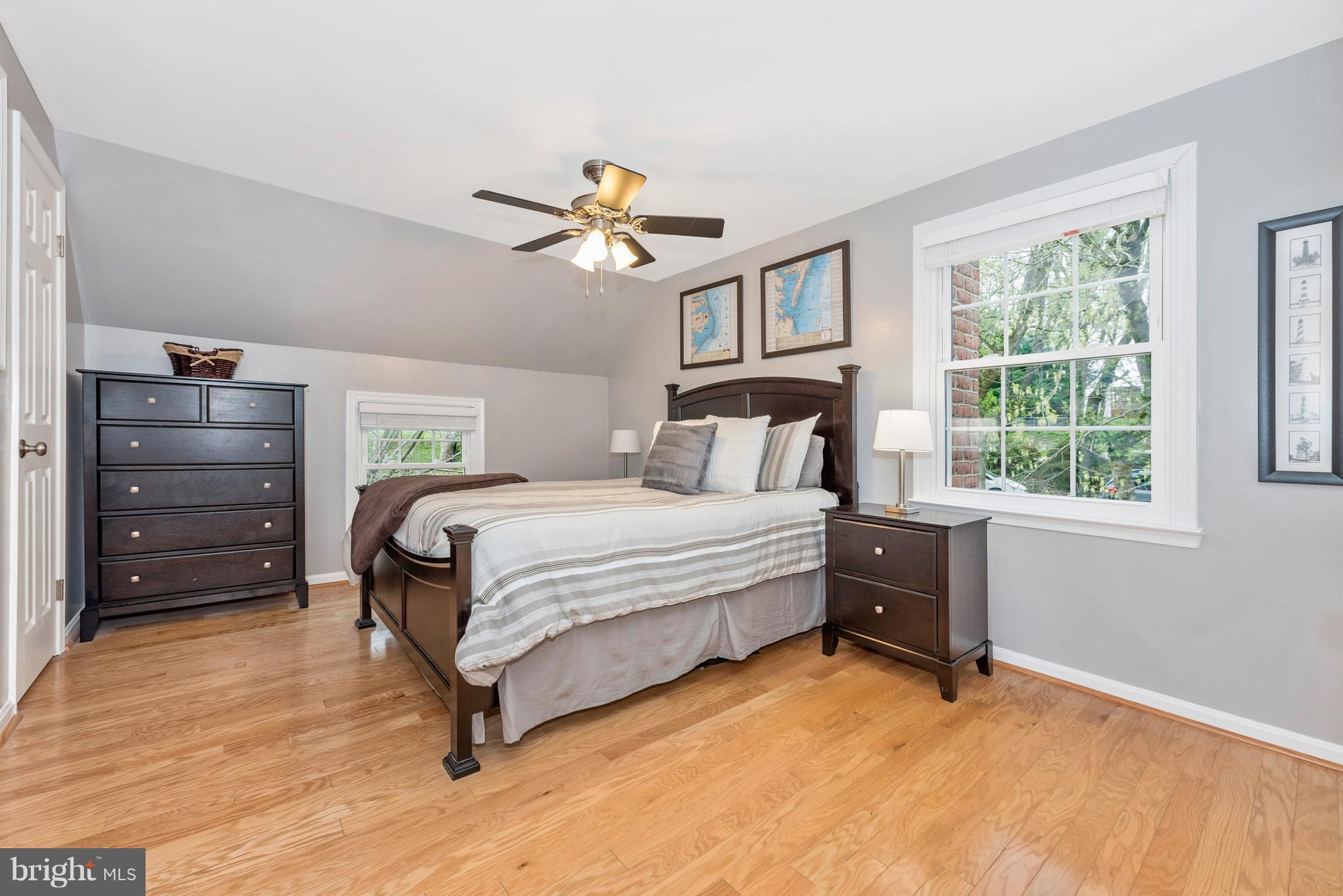 1706 Brookshire Run Point of Rocks, MD 21777 - Photo 16 of 29 a bedroom with a bed a dresser and a window