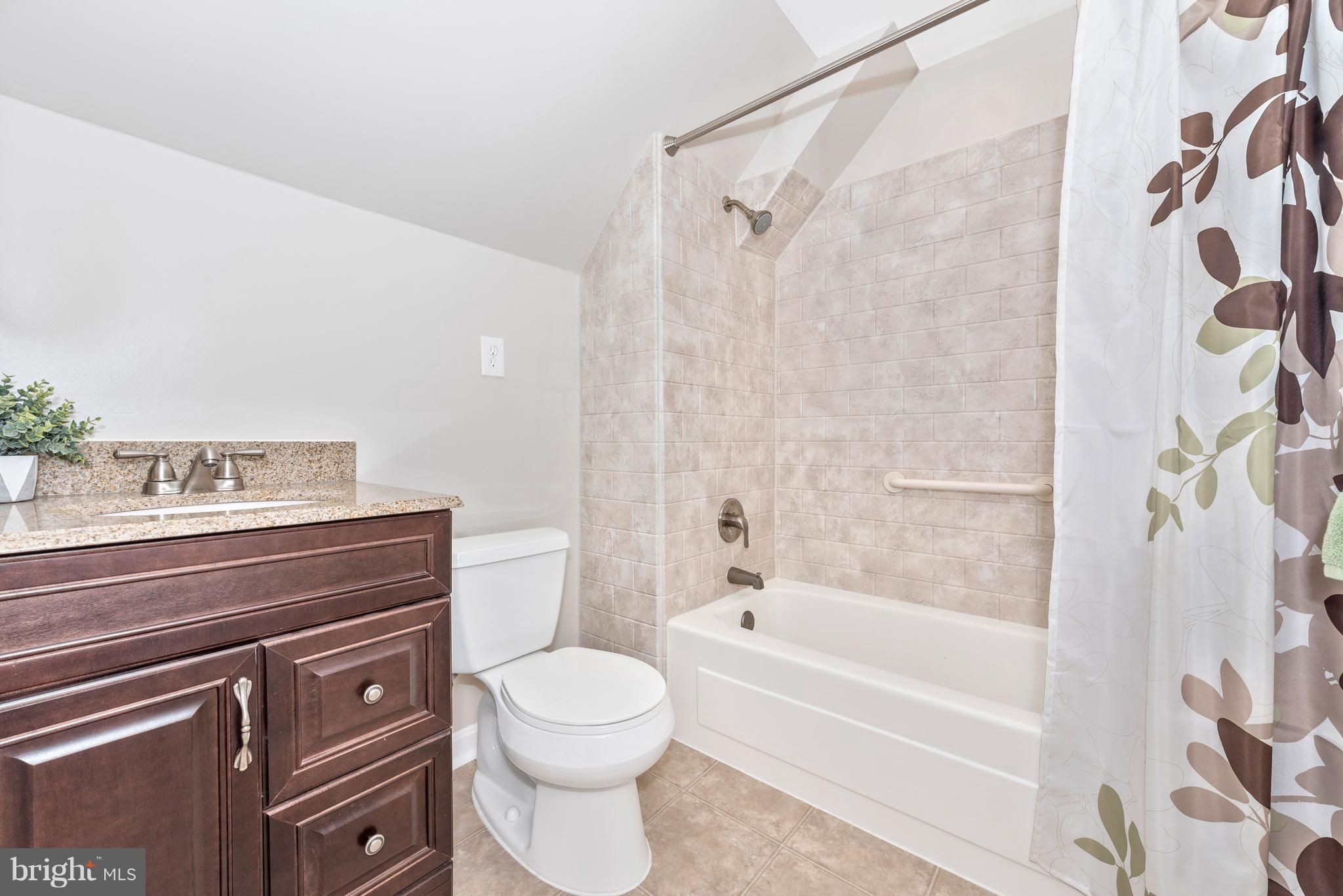 1706 Brookshire Run Point of Rocks, MD 21777 - Photo 17 of 29 a bathroom with a granite countertop bathtub shower sink vanity and toilet