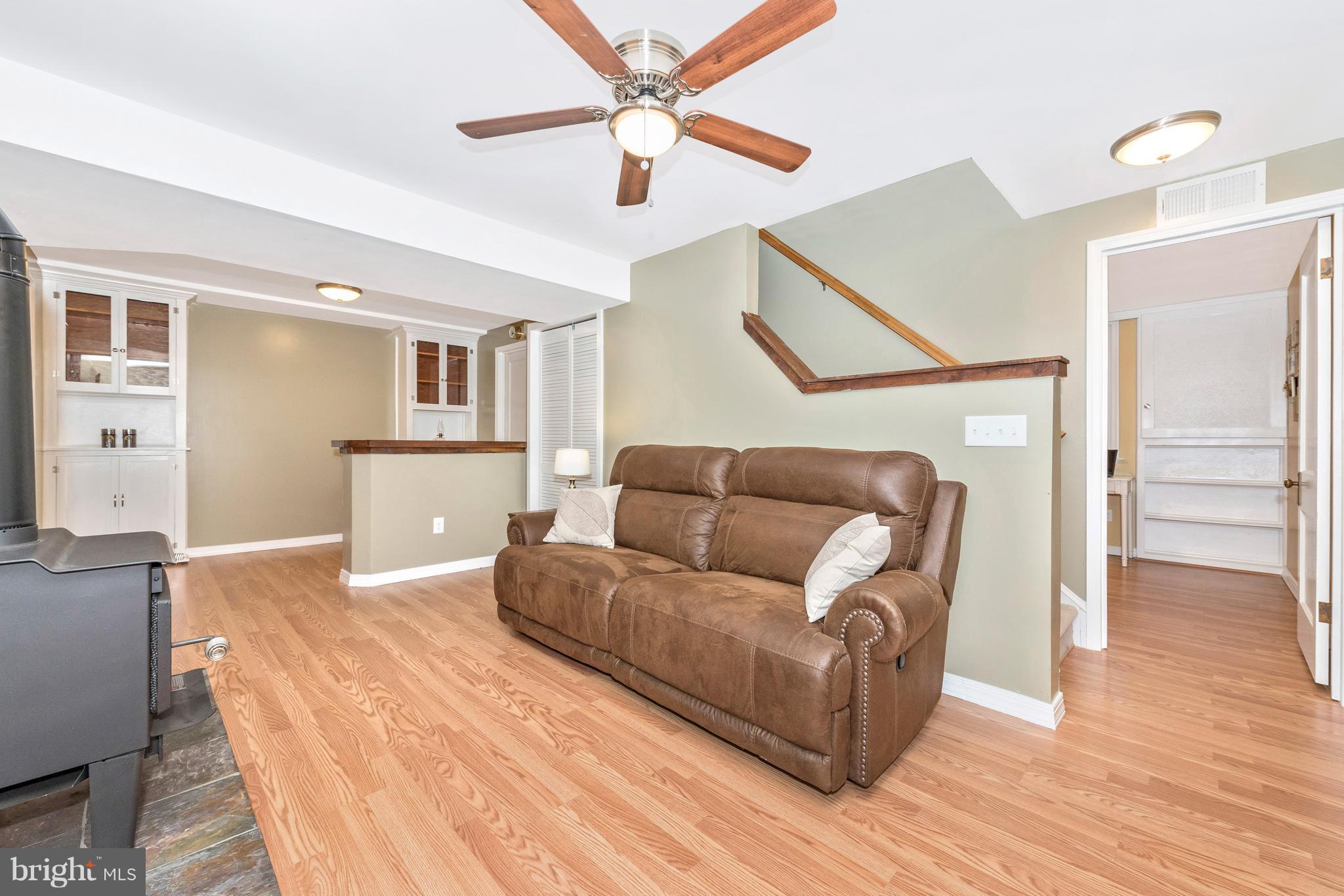 1706 Brookshire Run Point of Rocks, MD 21777 - Photo 18 of 29 a living room with furniture and a wooden floor