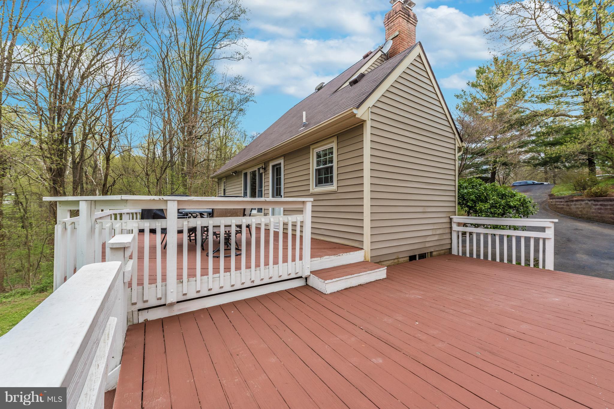 1706 Brookshire Run Point of Rocks, MD 21777 - Photo 22 of 29 a view of a wooden deck and a yard