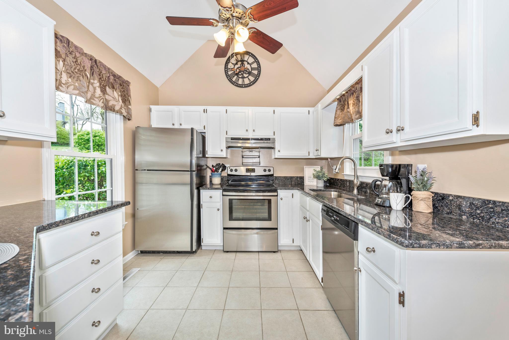 1706 Brookshire Run Point of Rocks, MD 21777 - Photo 4 of 29 a kitchen with stainless steel appliances granite countertop a refrigerator and a stove