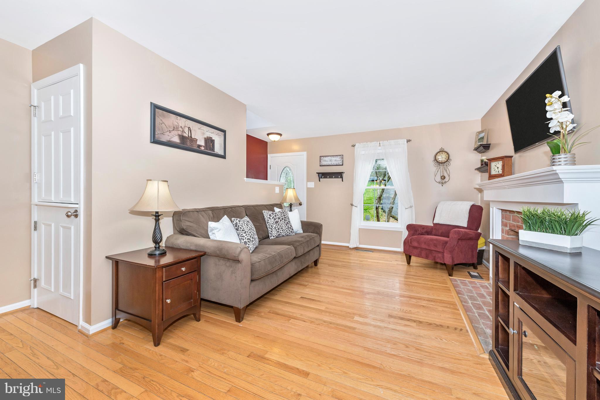 1706 Brookshire Run Point of Rocks, MD 21777 - Photo 6 of 29 a living room with furniture and a flat screen tv