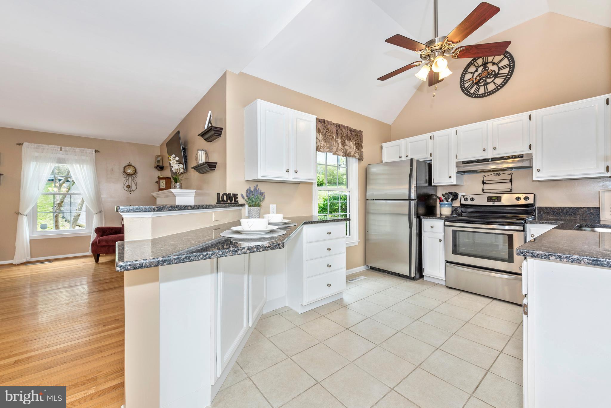 1706 Brookshire Run Point of Rocks, MD 21777 - Photo 9 of 29 a kitchen with a sink cabinets and stainless steel appliances