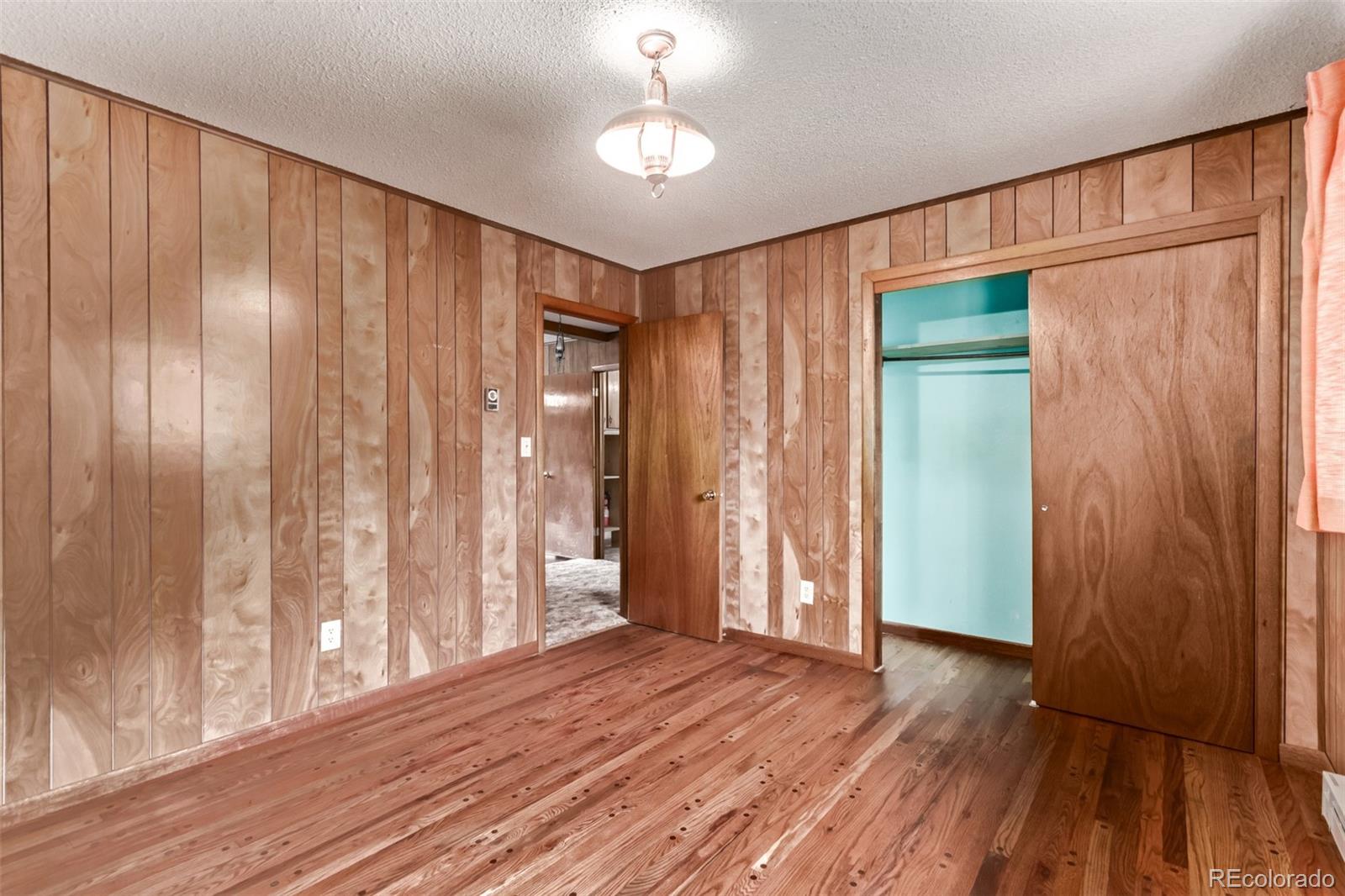 15481 Rist Canyon Road Bellvue, CO 80512 - Photo 22 of 50 a view of entryway with wooden floor
