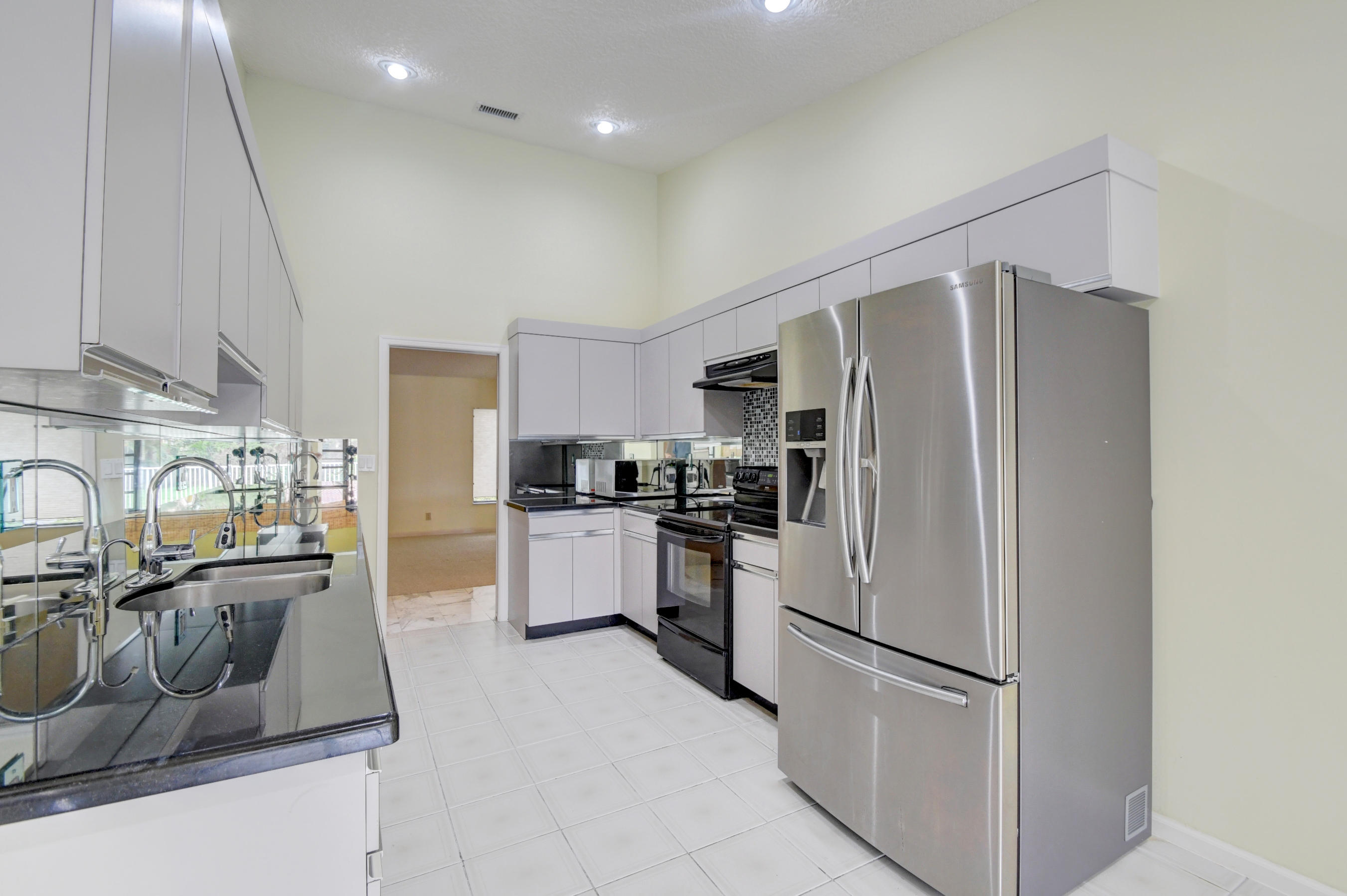 2602 Northwest 41st Street Boca Raton, FL 33434 - Photo 13 of 47 DSC_6121_2_3_4_5