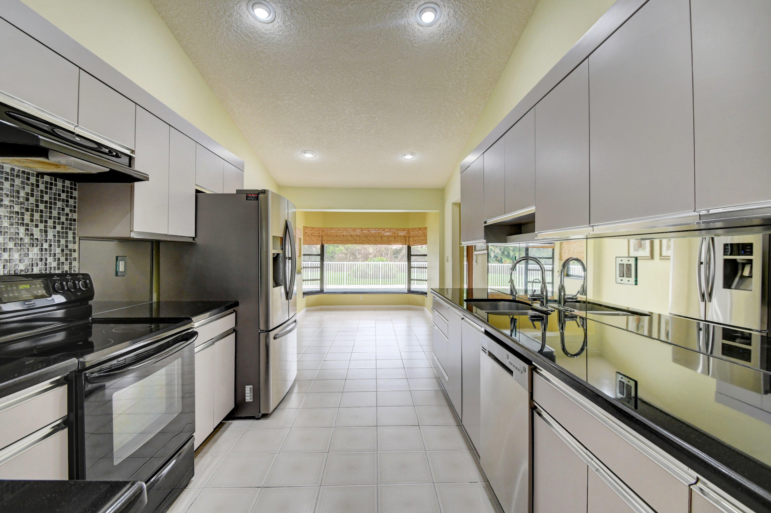 2602 Northwest 41st Street Boca Raton, FL 33434 - Photo 9 of 47 DSC_6101_2_3_4_5