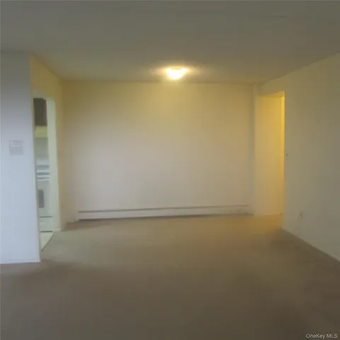 a bathroom with a bathtub and toilet