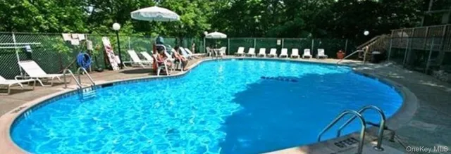 a black and white photo of a living room