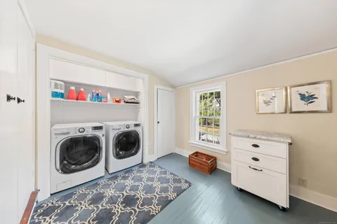 a utility room with dryer and washer