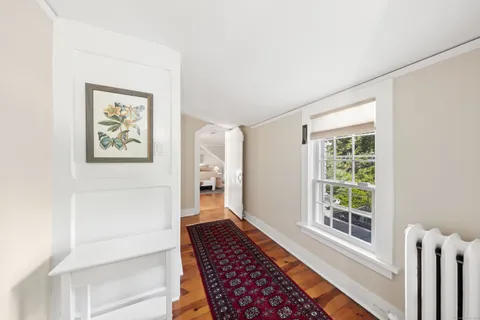 a room with furniture and a window