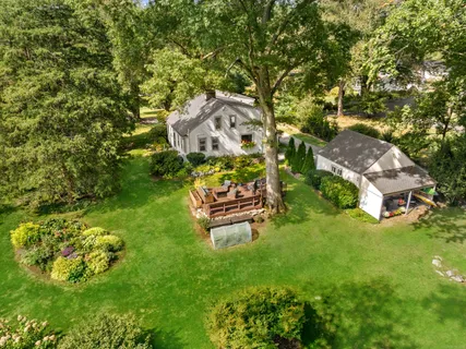 an aerial view of a house with a garden
