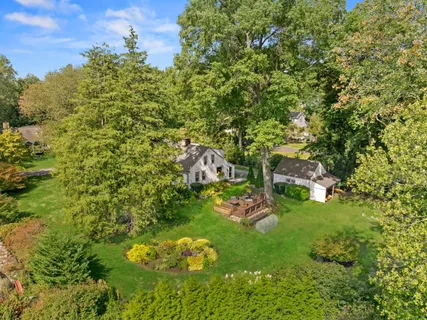 a backyard of a house with lots of green space