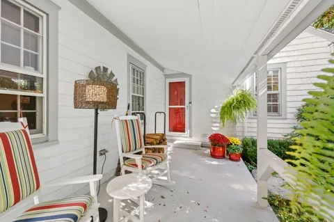 a view of front door with furniture