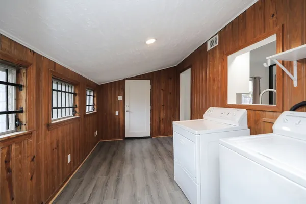 a view of livingroom with washer and dryer