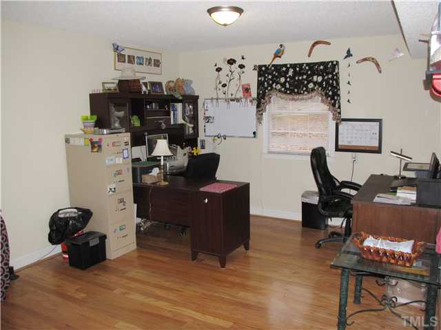 103 Dabney Road Cary, NC 27511 - Photo 20 of 25 a view of livingroom with workspace and a window