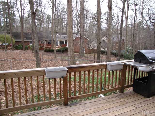 103 Dabney Road Cary, NC 27511 - Photo 23 of 25 a view of a two chairs on the deck