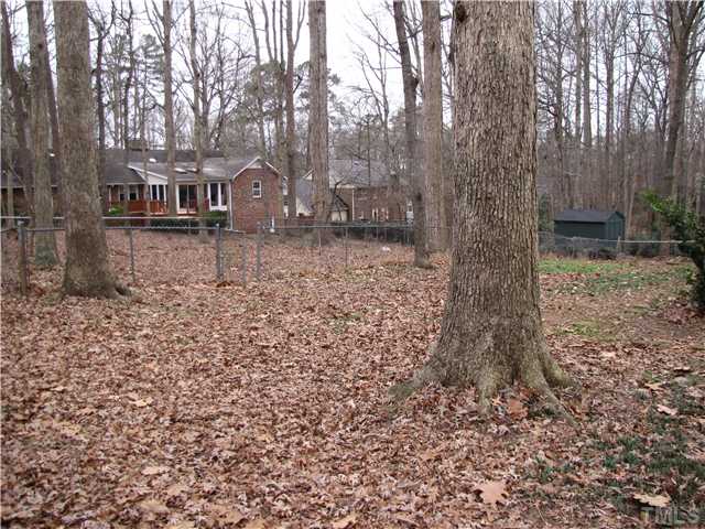 103 Dabney Road Cary, NC 27511 - Photo 24 of 25 a view of a house with a yard