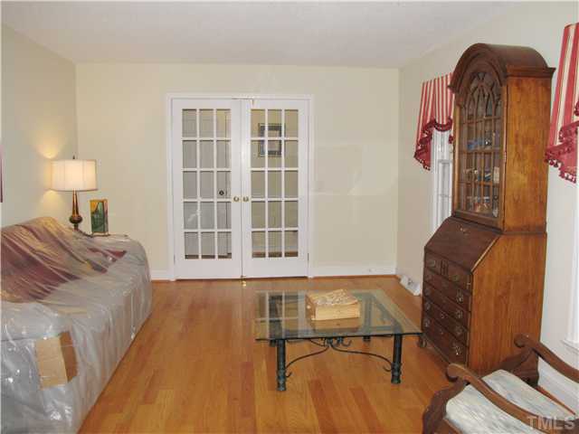 103 Dabney Road Cary, NC 27511 - Photo 4 of 25 a living room with furniture and a window