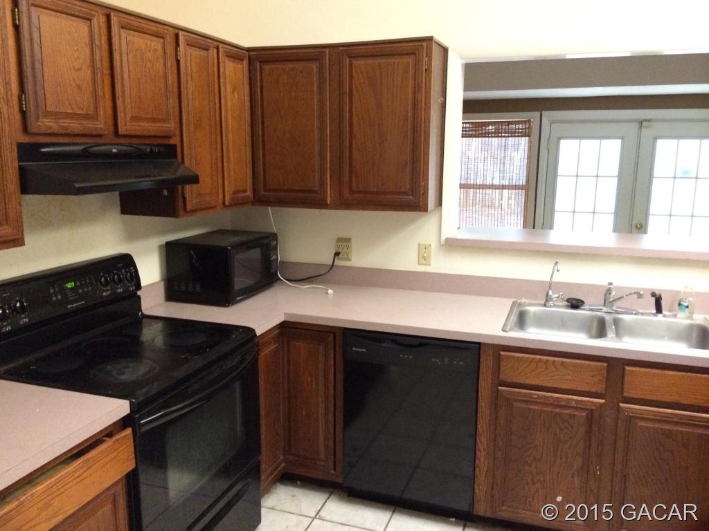 7716 Southwest 6th Place Gainesville, FL 32607 - Photo 3 of 13 Kitchen