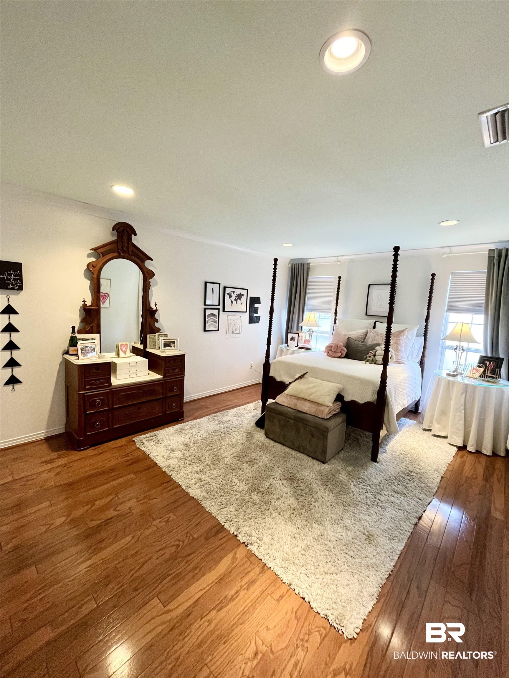 451 Ridgelawn Drive West Mobile, AL 36608 - Photo 28 of 41 Bedroom featuring multiple windows, dark wood finished floors, recessed lighting, and baseboards