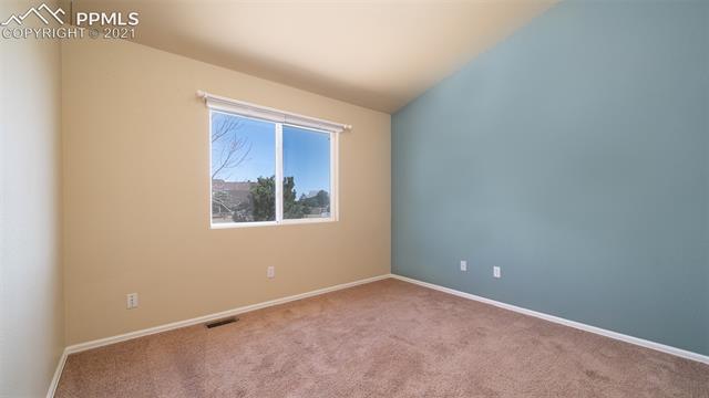 9061 Tompkins Road Peyton, CO 80831 - Photo 14 of 27 main level bedroom