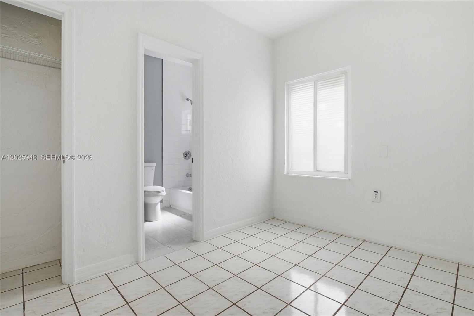 1745 Southwest 17th Street, Unit 2 Miami, FL 33145 - Photo 20 of 32 a bathroom with a toilet