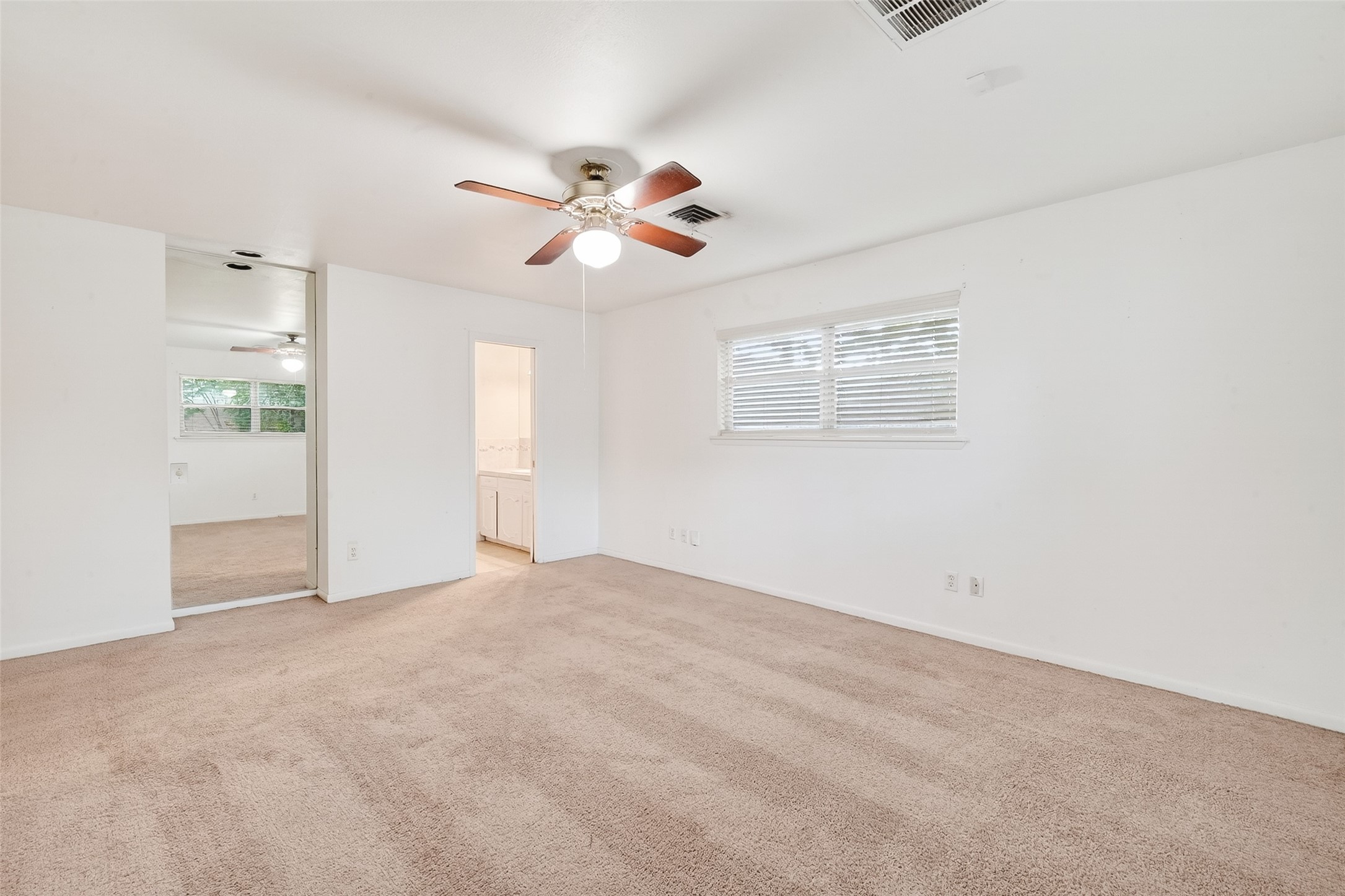5422 Spellman Road Houston, TX 77096 - Photo 13 of 27 a view of an empty room with a window