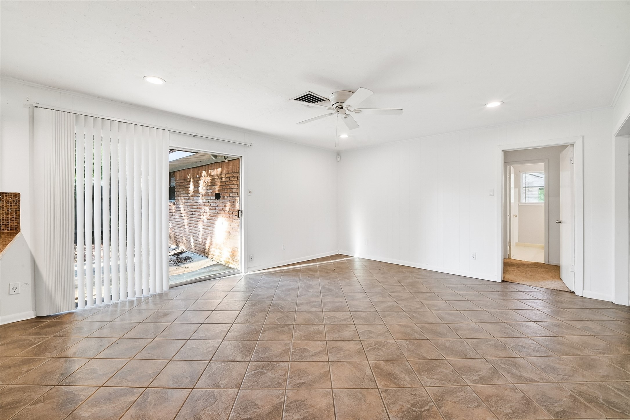 5422 Spellman Road Houston, TX 77096 - Photo 6 of 27 a view of a livingroom with a staircase