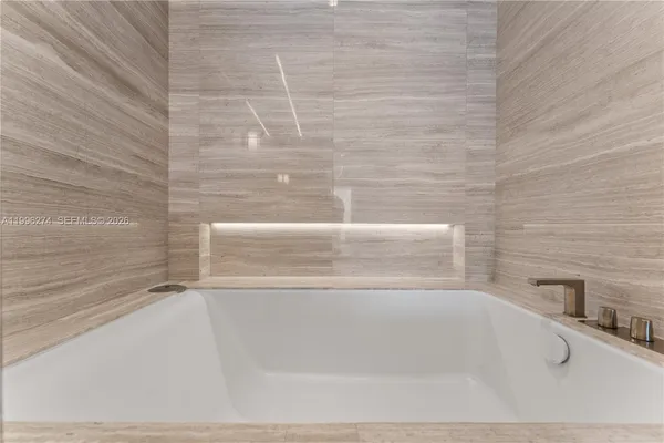 a close up of a bathtub