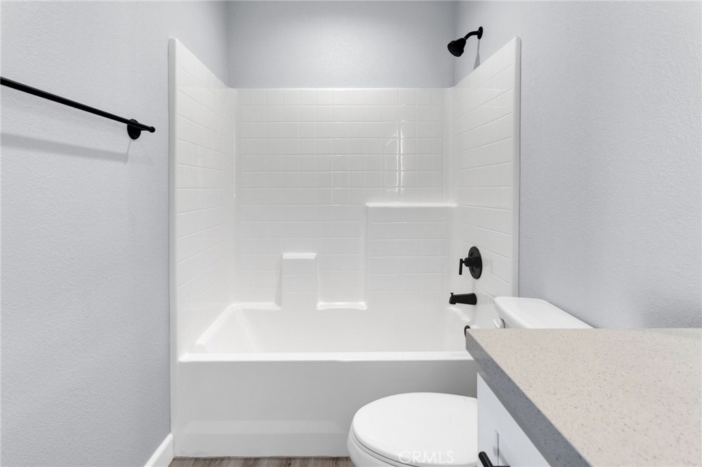 36165 Sutter Road Lucerne Valley, CA 92356 - Photo 20 of 42 a bathroom with a sink a toilet and a bathtub