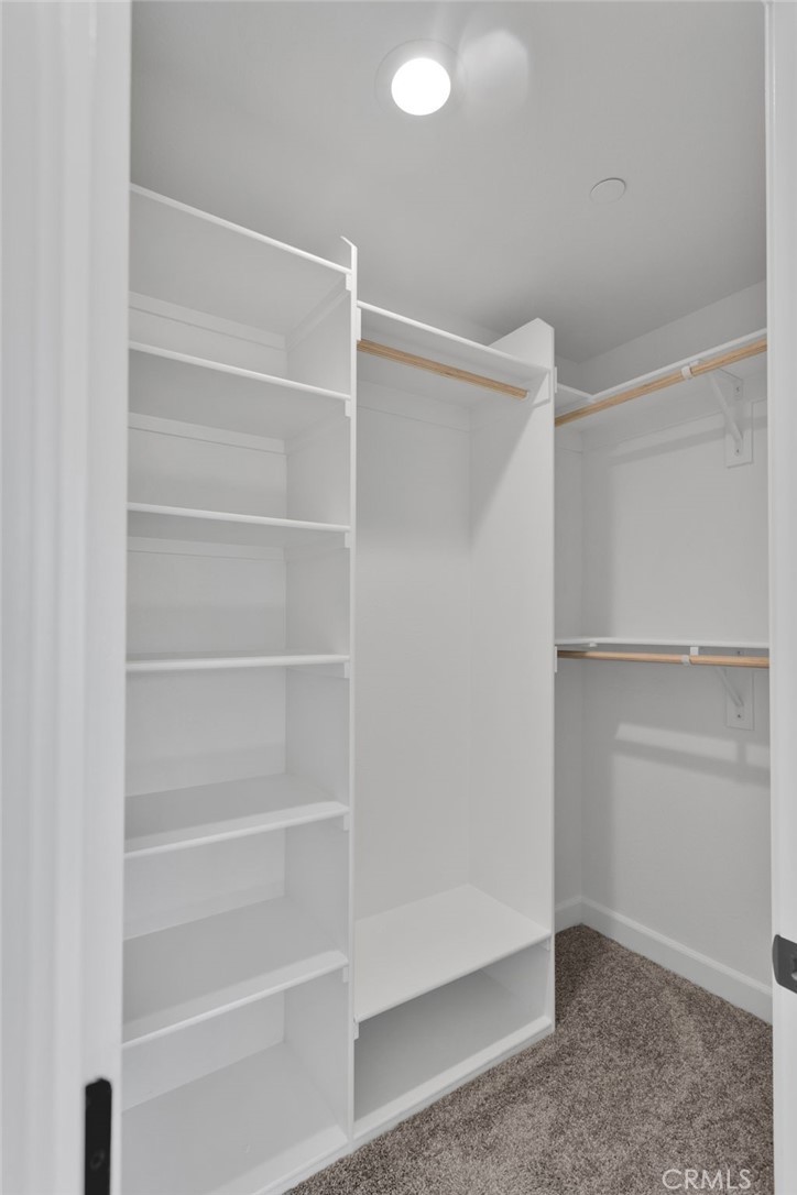 36165 Sutter Road Lucerne Valley, CA 92356 - Photo 29 of 42 a view of walk in closet with empty racks