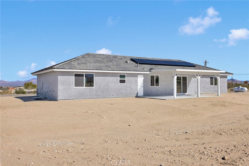 36165 Sutter Road Lucerne Valley, CA 92356 - Photo 33 of 42 a house with outdoor space