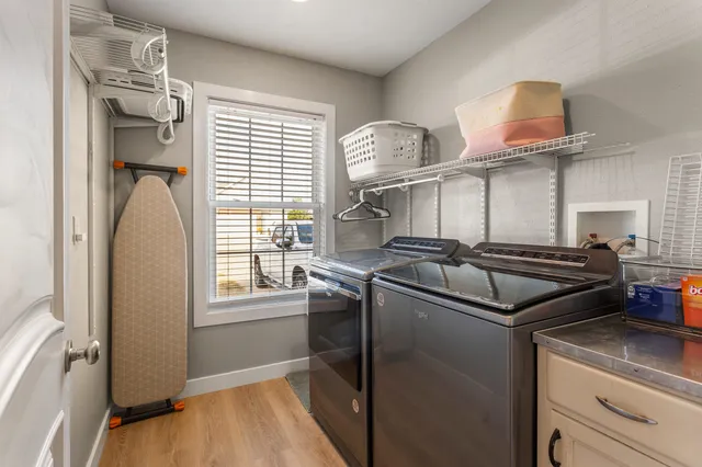 a kitchen with a stove and a refrigerator