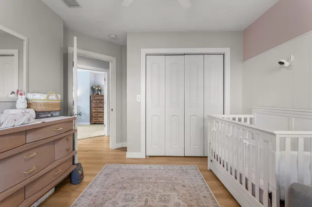a view of a hallway with a bedroom