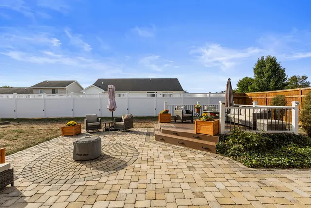 a view of a terrace with chairs
