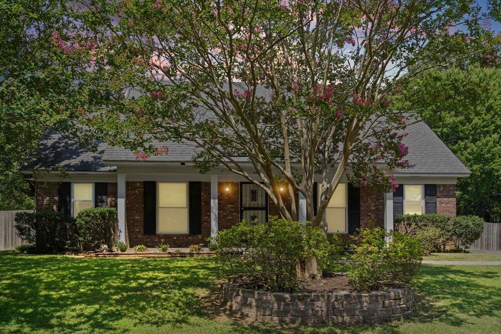 461 Dove Valley Road Collierville, TN 38017 - Photo 2 of 33 a front view of a house with a yard