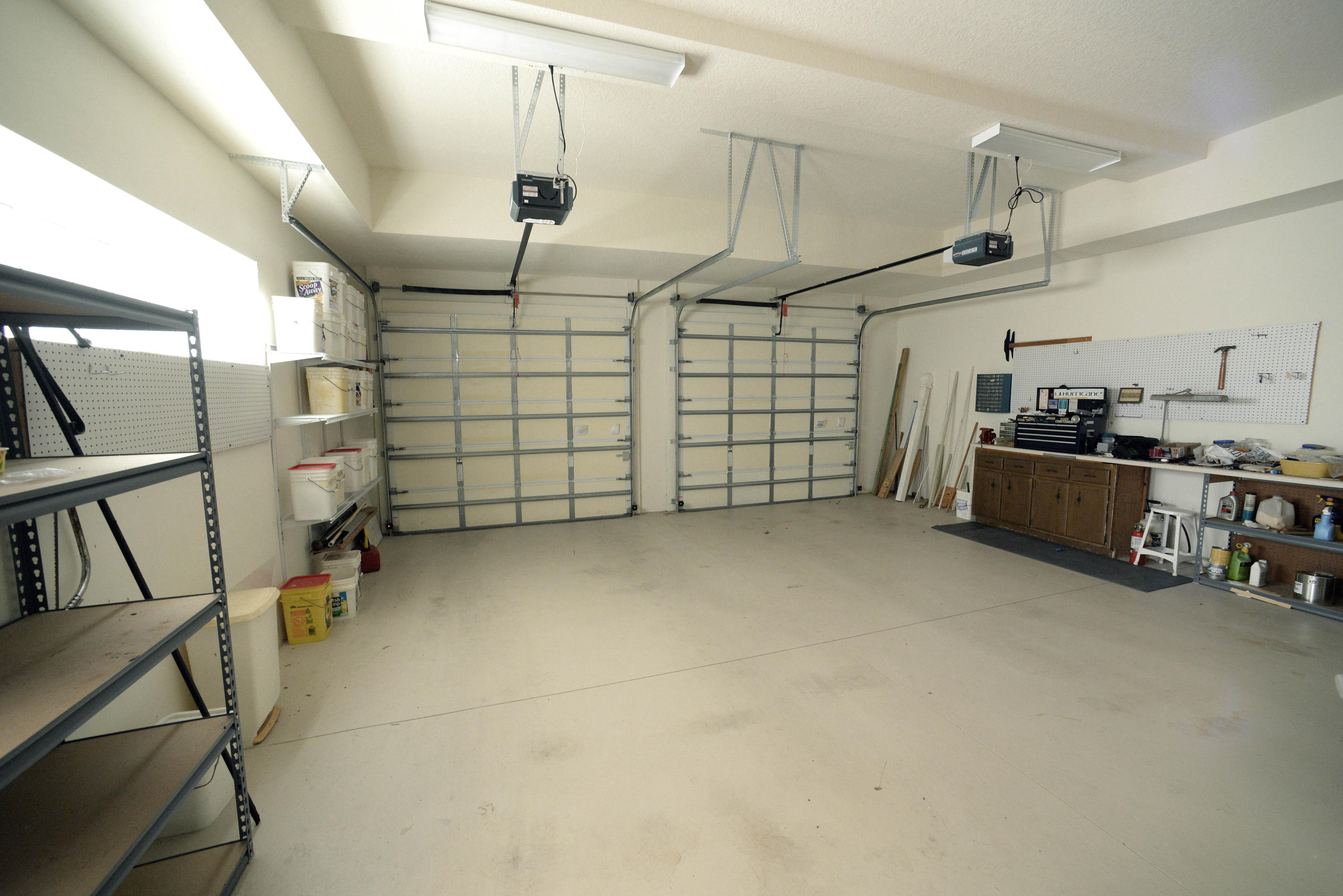 481 Olympus Drive, Unit 201 Juno Beach, FL 33408 - Photo 19 of 23 a view of a garage