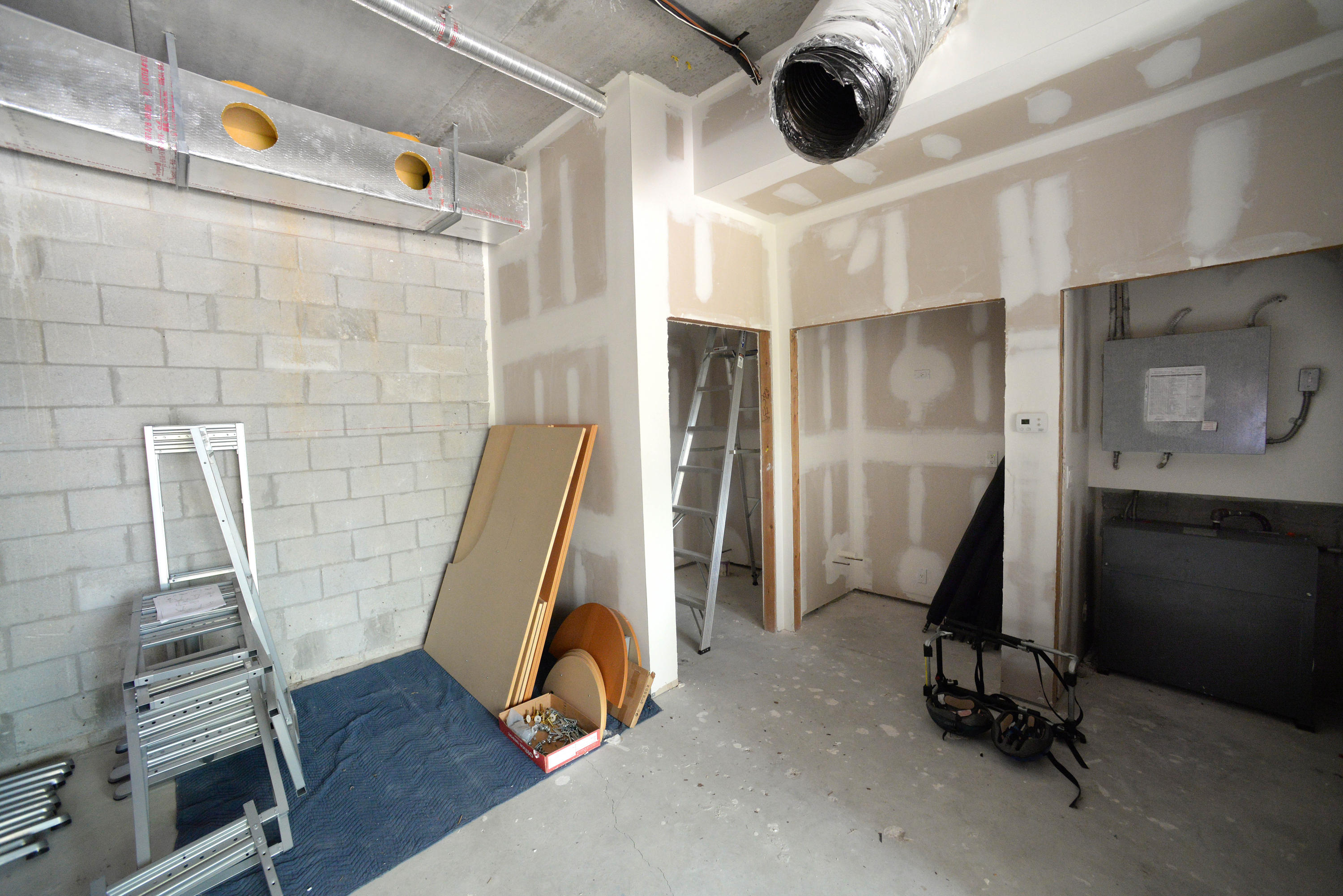 481 Olympus Drive, Unit 201 Juno Beach, FL 33408 - Photo 21 of 23 a view of a room with gym equipment