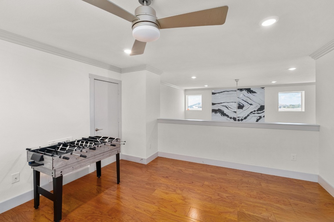 7709 Jacobean Way Austin, TX 78724 - Photo 16 of 23 a view of a room with window and wooden floor