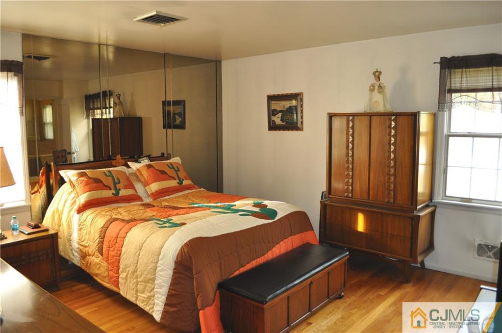 168 Colonia Road Colonia, NJ 07067 - Photo 14 of 23 a bedroom with a bed and a window