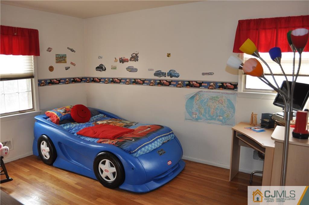 168 Colonia Road Colonia, NJ 07067 - Photo 17 of 23 a car with car and wooden floor