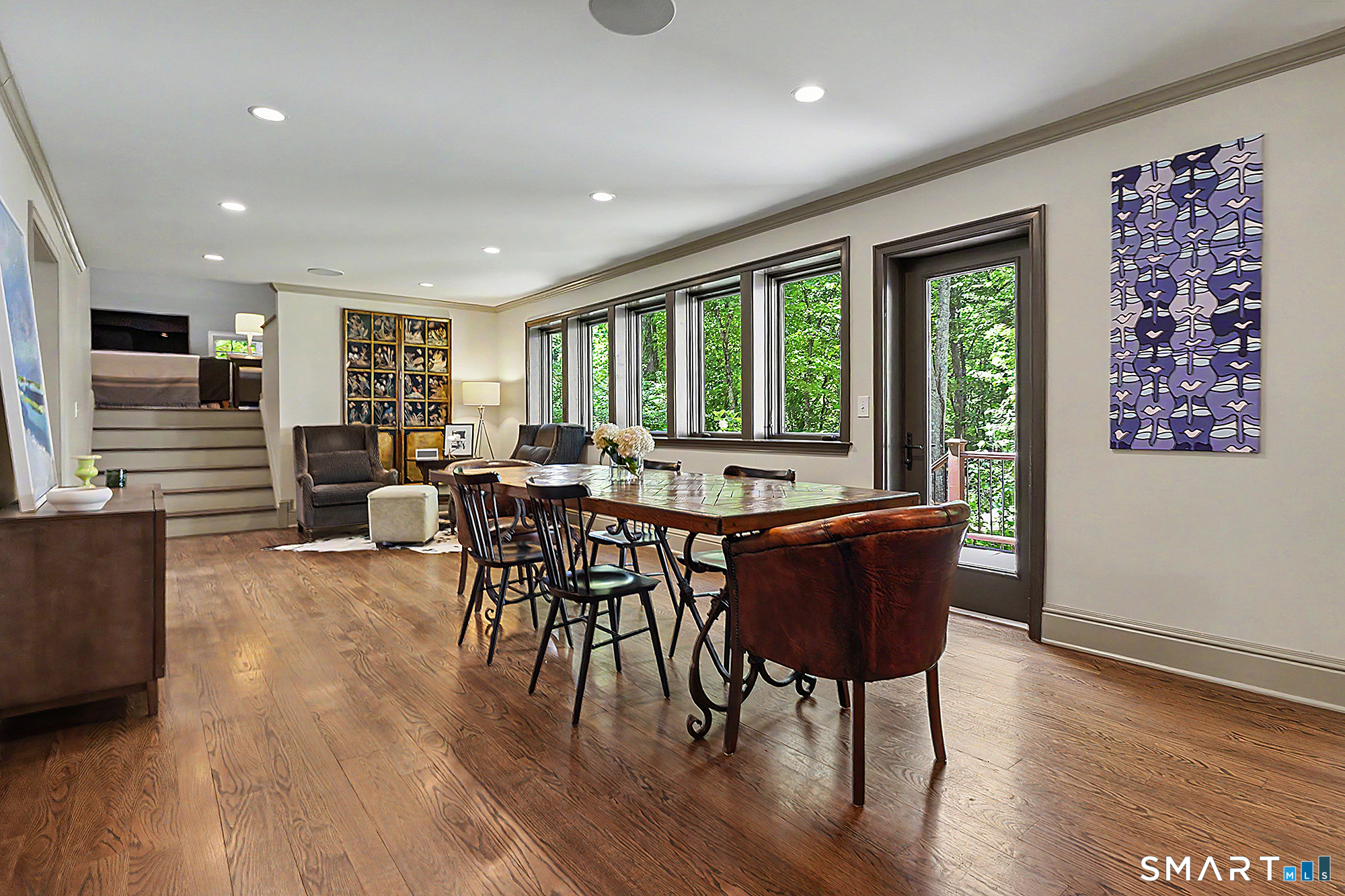 33 Hunter Lane Ridgefield, CT 06877 - Photo 9 of 39 a view of a dining room with furniture window and wooden floor