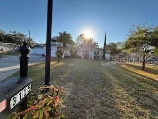 a view of a road with a yard