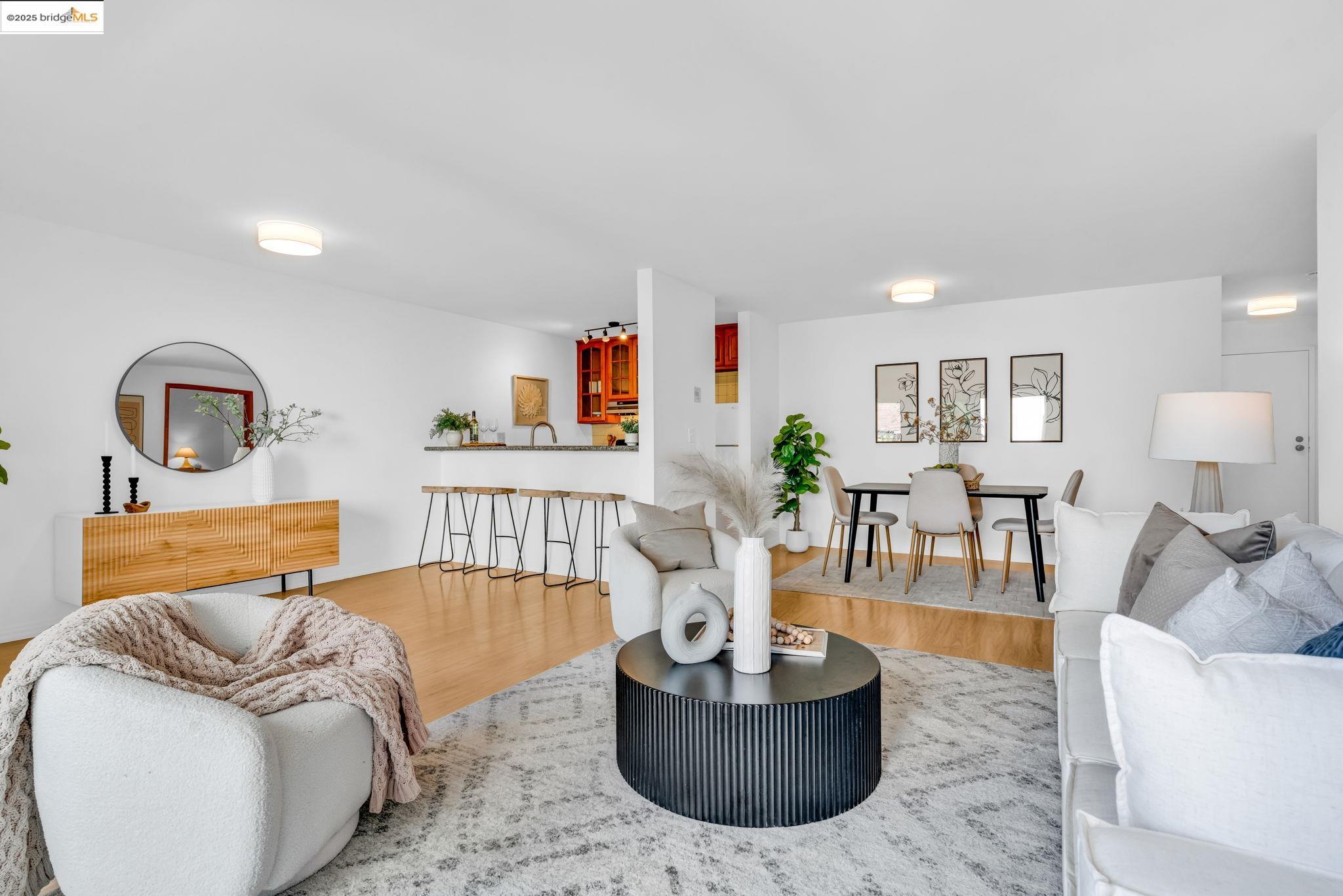 288 Whitmore Street, Unit 220 Oakland, CA 94611 - Photo 1 of 38 Living room with wood finished floors
