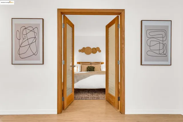 a en suite bathroom with a shower and a mirror