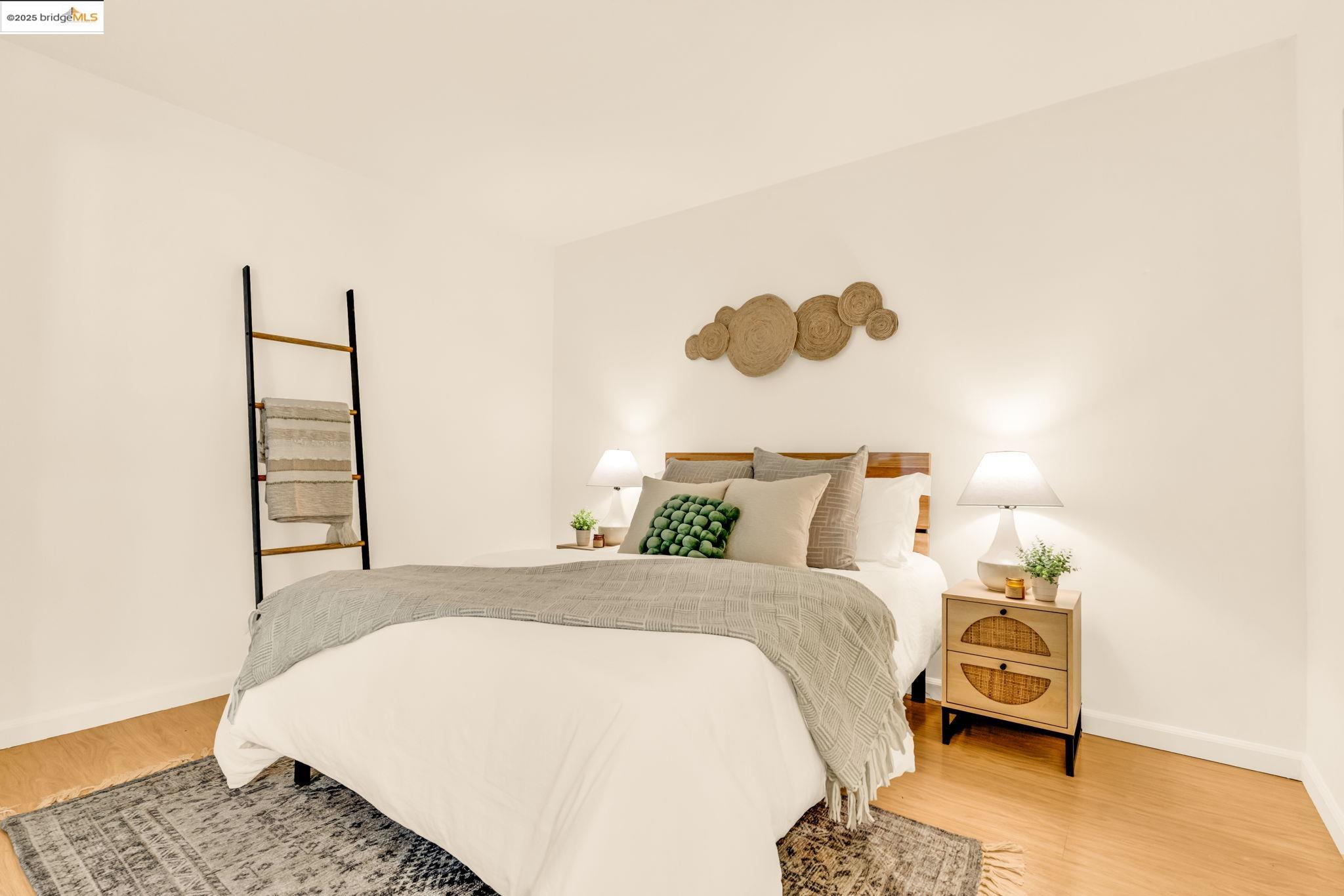 288 Whitmore Street, Unit 220 Oakland, CA 94611 - Photo 25 of 38 Bedroom featuring light wood finished floors