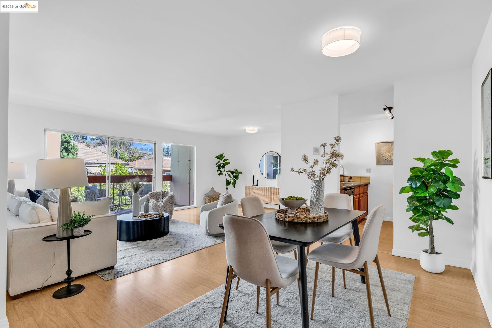 288 Whitmore Street, Unit 220 Oakland, CA 94611 - Photo 3 of 38 Dining space featuring light wood finished floors and baseboards